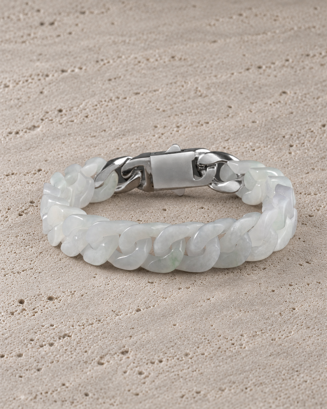 Classic Cuban Link Chain Bracelet in White Jade, product view on warm grey stone.