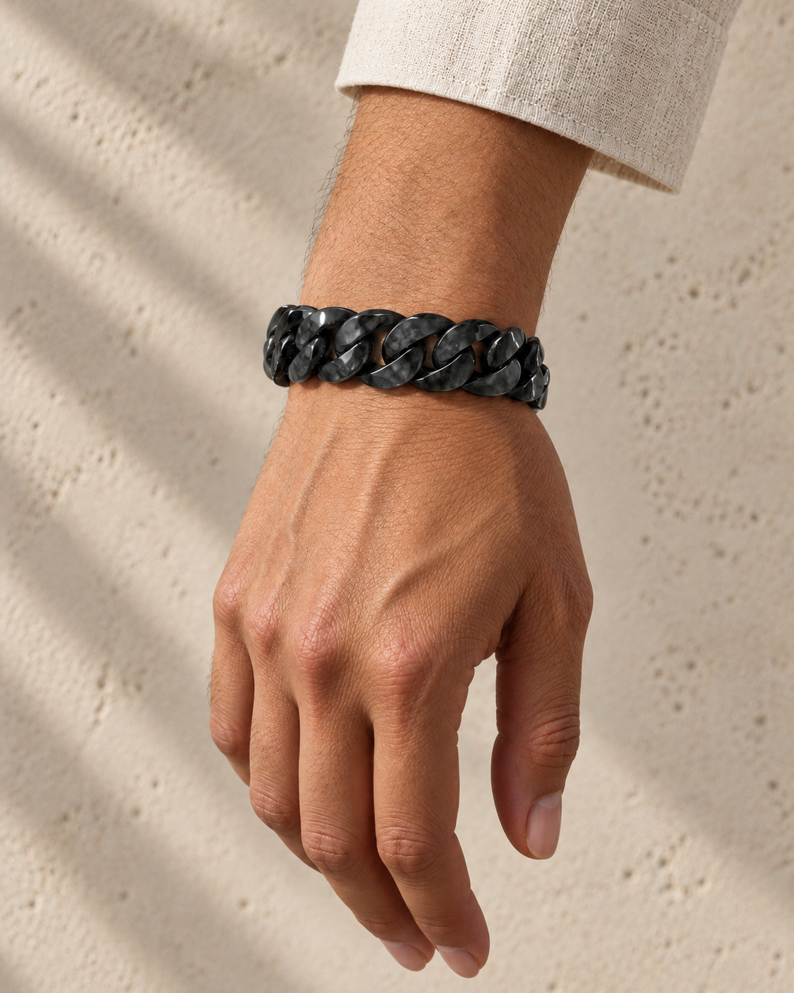 Single Piece Carved Cuban Chain Bracelet in Black Jade, worn on the wrist.