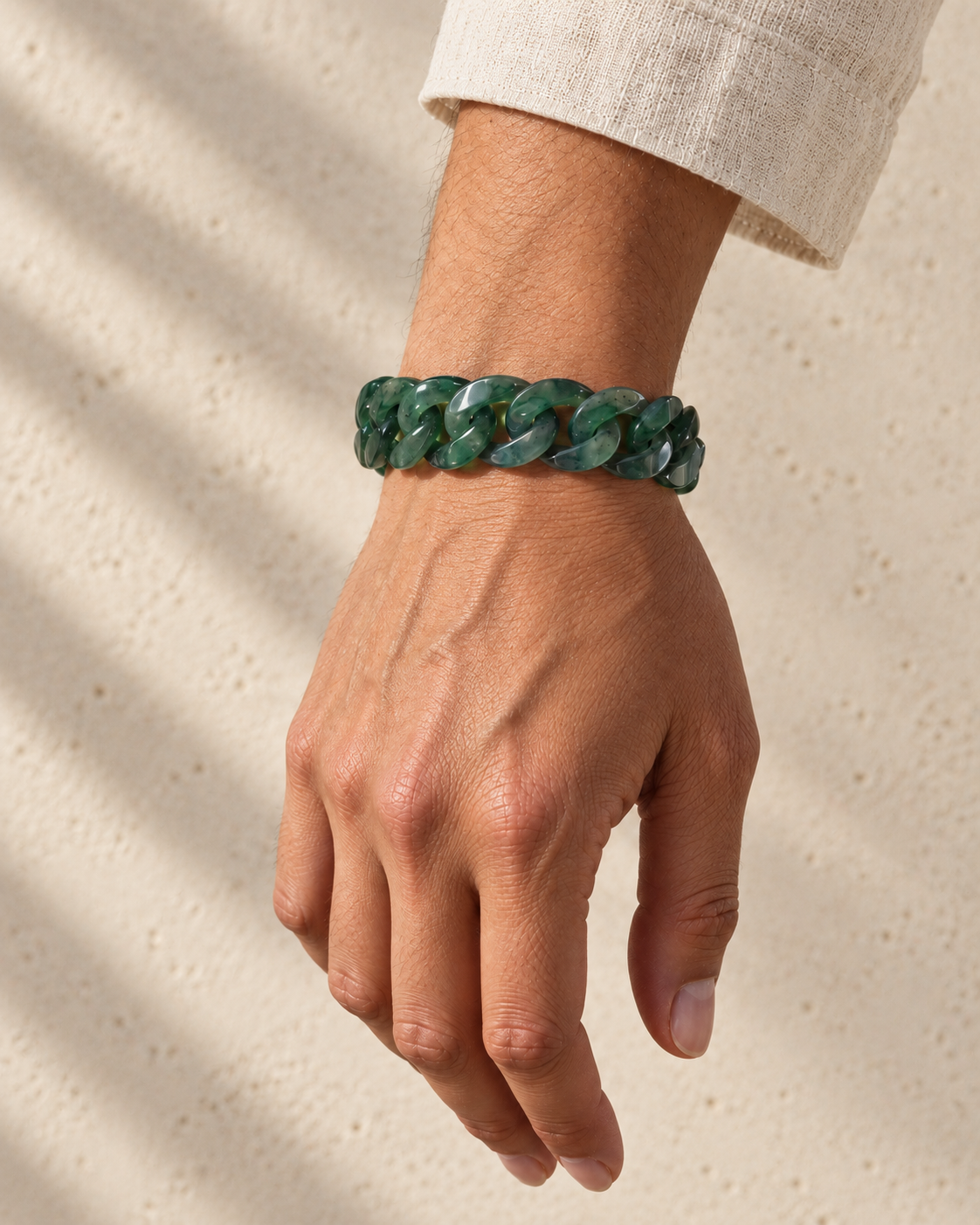 Classic Cuban Link Chain Bracelet in African Green Jade, worn on the wrist.