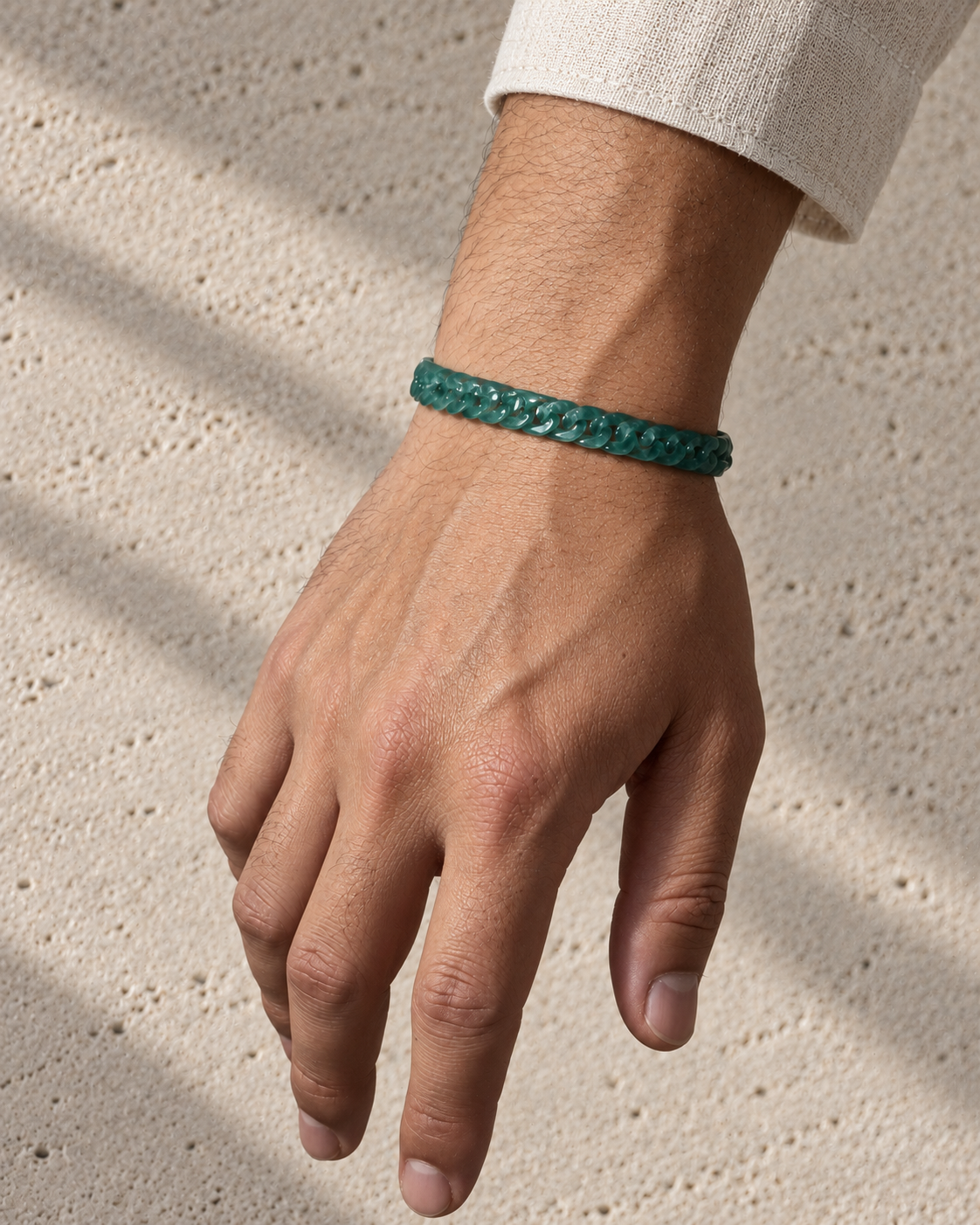 Slim Style Cuban Link Chain Bracelet in Mayan Blue Jade, worn on the wrist.