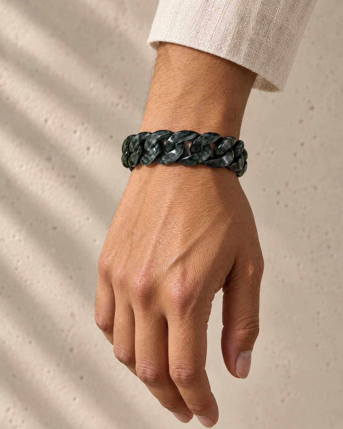 Classic Cuban Link Chain Bracelet in Dark Green Nephrite, worn on the wrist.