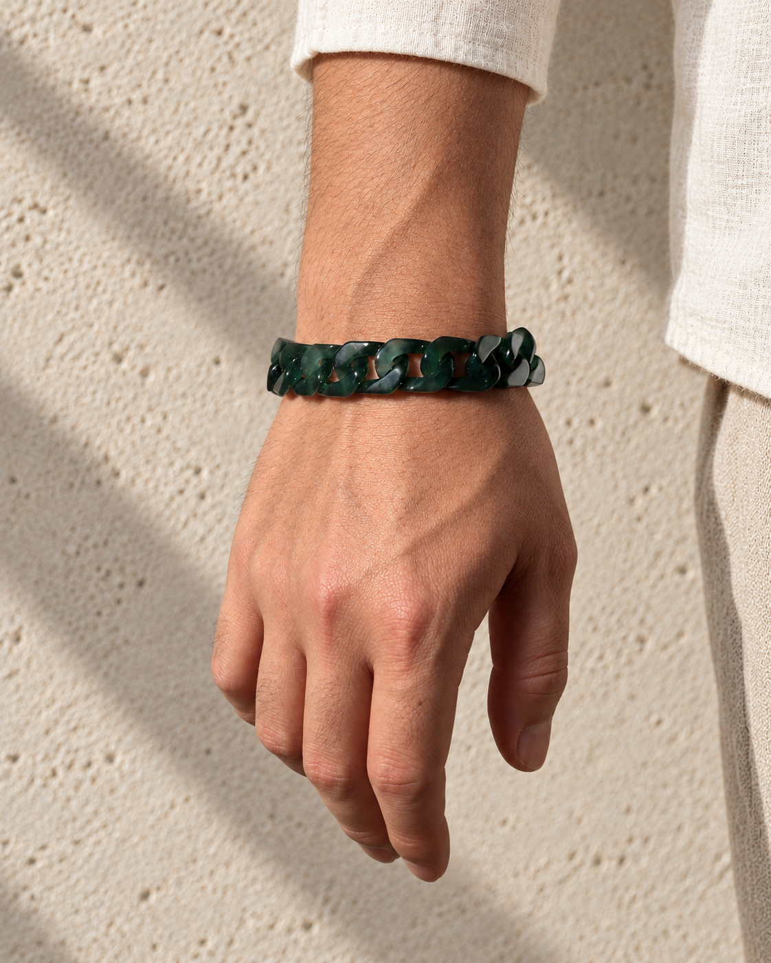 Classic Cuban Link Chain Bracelet in Jelly Green Mayan Jade, worn on the wrist.