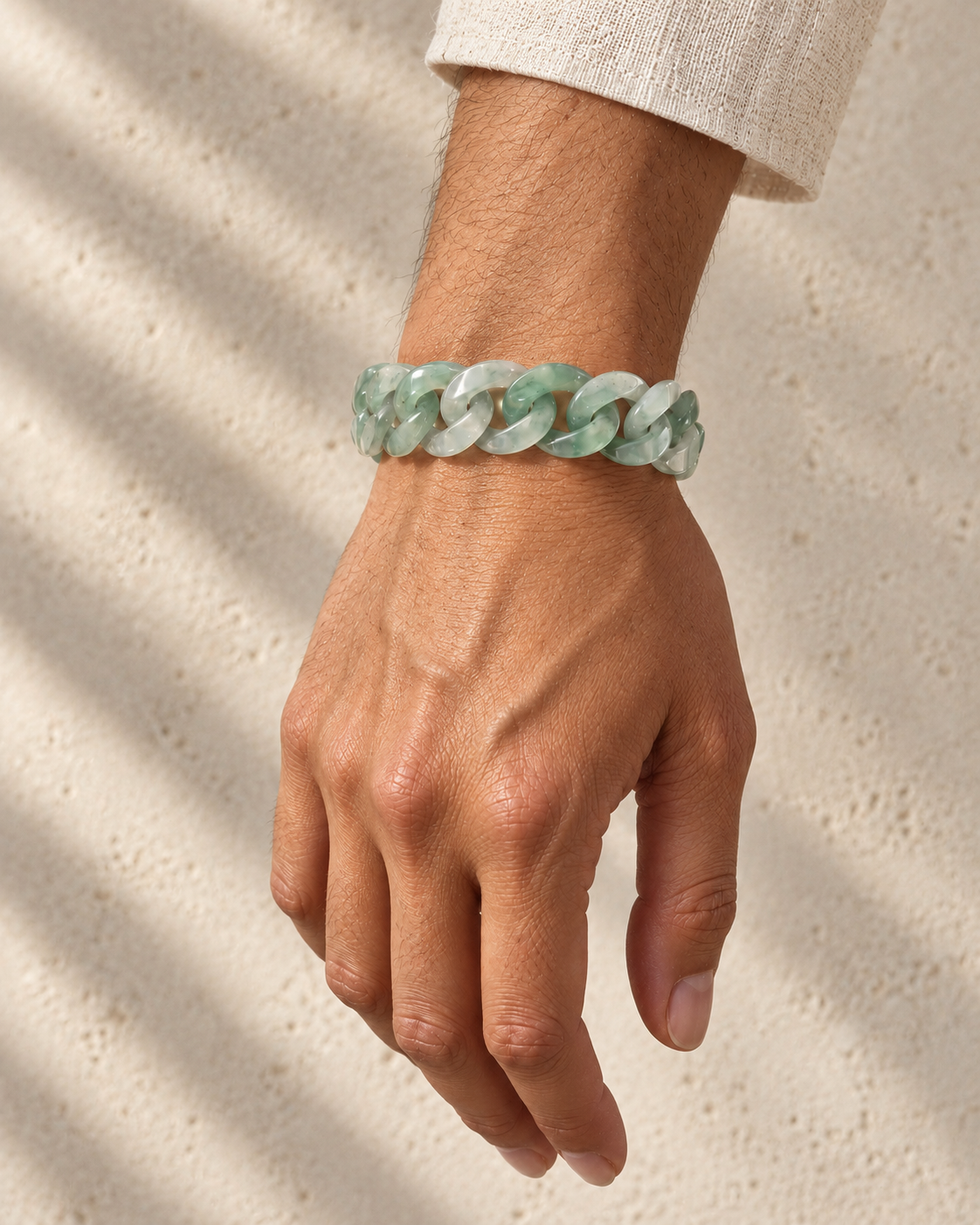 Classic Cuban Link Chain Bracelet in Light Green African Jade, worn on the wrist.