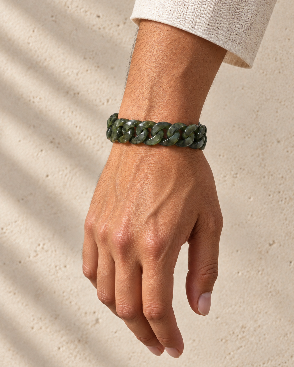 Classic Cuban Link Chain Bracelet in Light Green Nephrite, worn on the wrist.