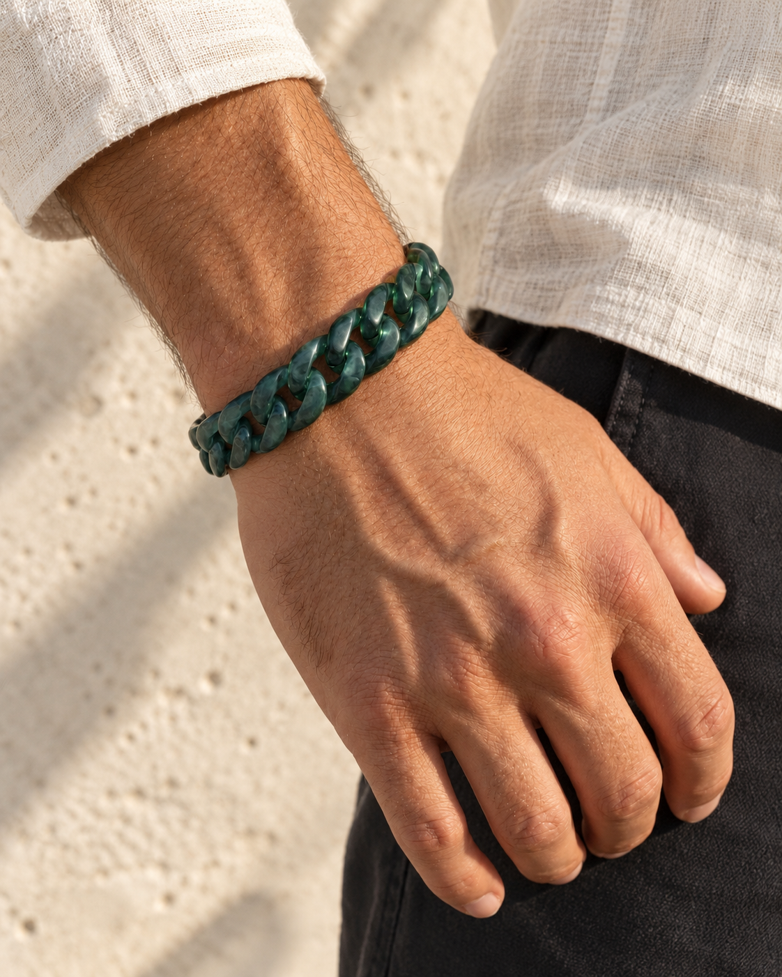 Classic Cuban Link Chain Bracelet in Top Icy Dark Green Guatemalan Jade, worn on the wrist.