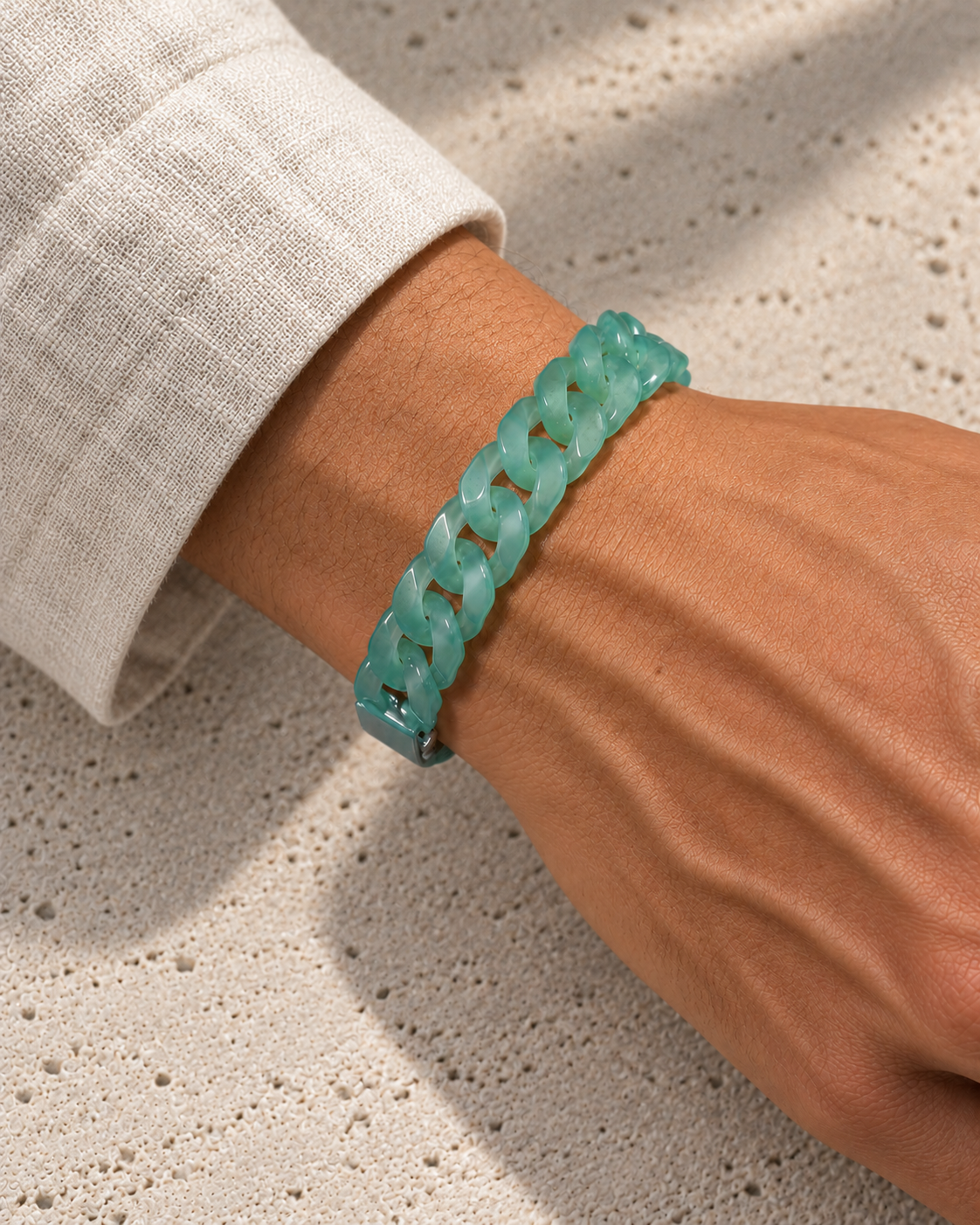 Classic Cuban Link Chain Bracelet in Blue-Green Jadeite, worn on the wrist.