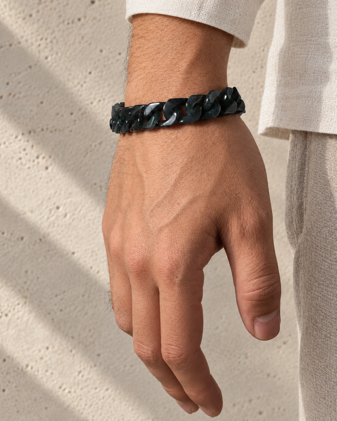Classic Cuban Link Chain Bracelet in Black Jade, worn on the wrist.