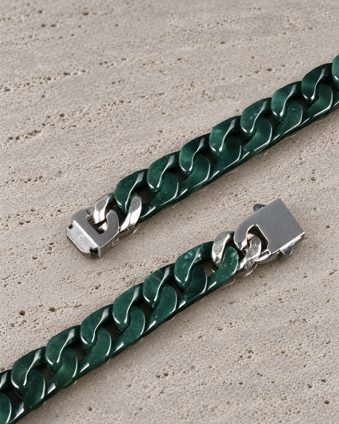 Classic Cuban Link Chain Bracelet in Jelly Green Mayan Jade, clasp close-up on matte grey stone.