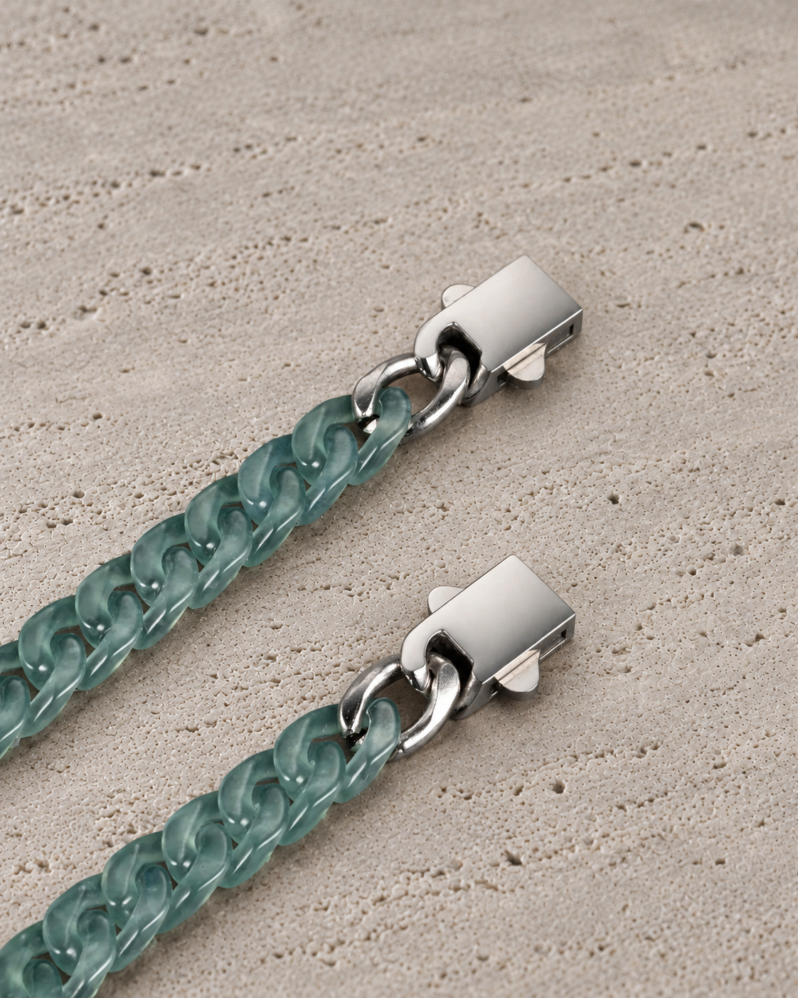 Slim Style Cuban Link Chain Bracelet in Mayan Blue Jade, clasp close-up on matte grey stone.