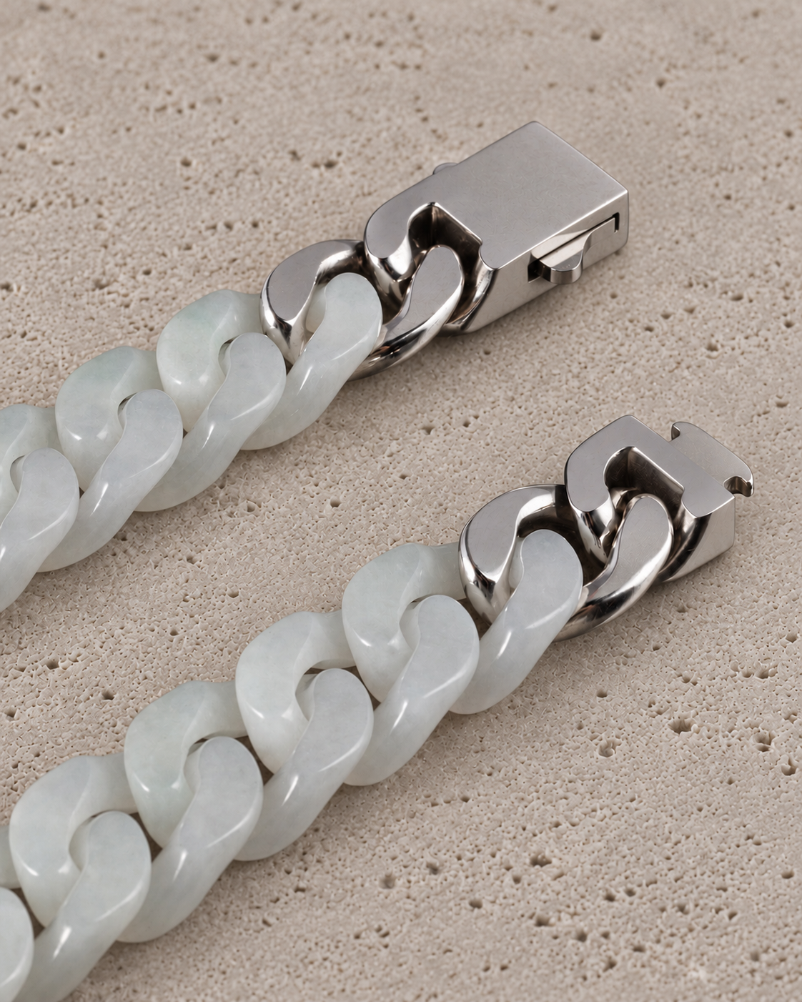 Classic Cuban Link Chain Bracelet in White Jade, clasp close-up on matte grey stone.