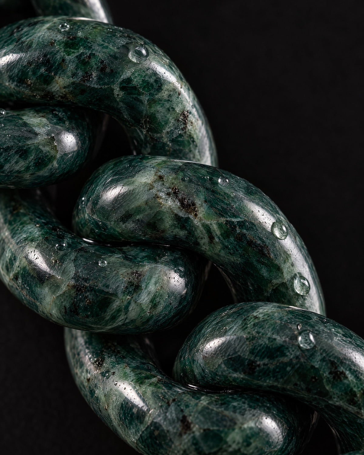 Finish texture close-up of Single Piece Carved Cuban Chain Bracelet In Dark Green Jade