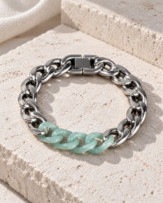 Classic Cuban Chain Bracelet In Green Jade With Stainless Steel on flat pale stone