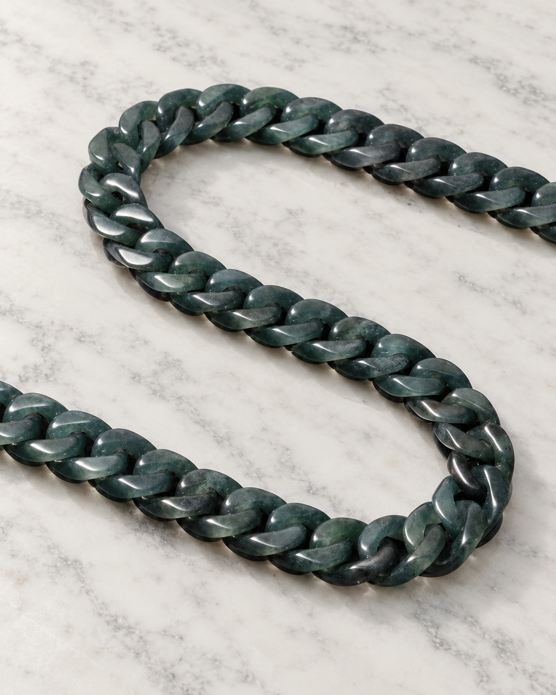 Classic Cuban Link Chain Necklace In Black Jade on white stone: marble tabletop detail — 8mm