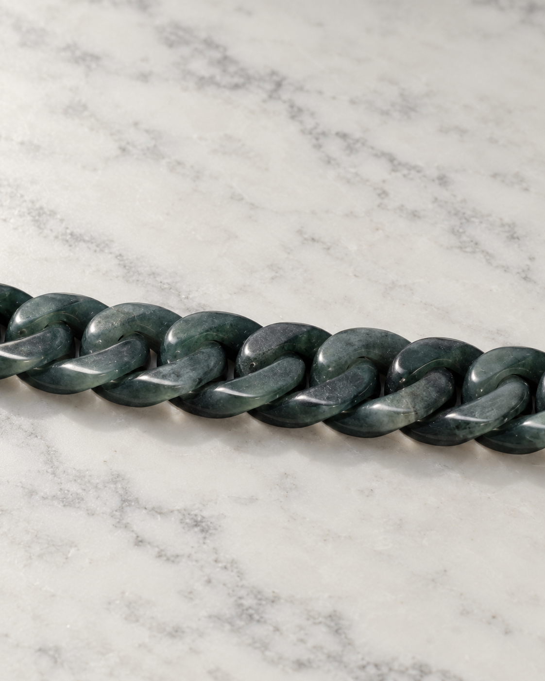 Classic Cuban Link Chain Bracelet In Black Jade on white stone: marble tabletop detail — 8mm