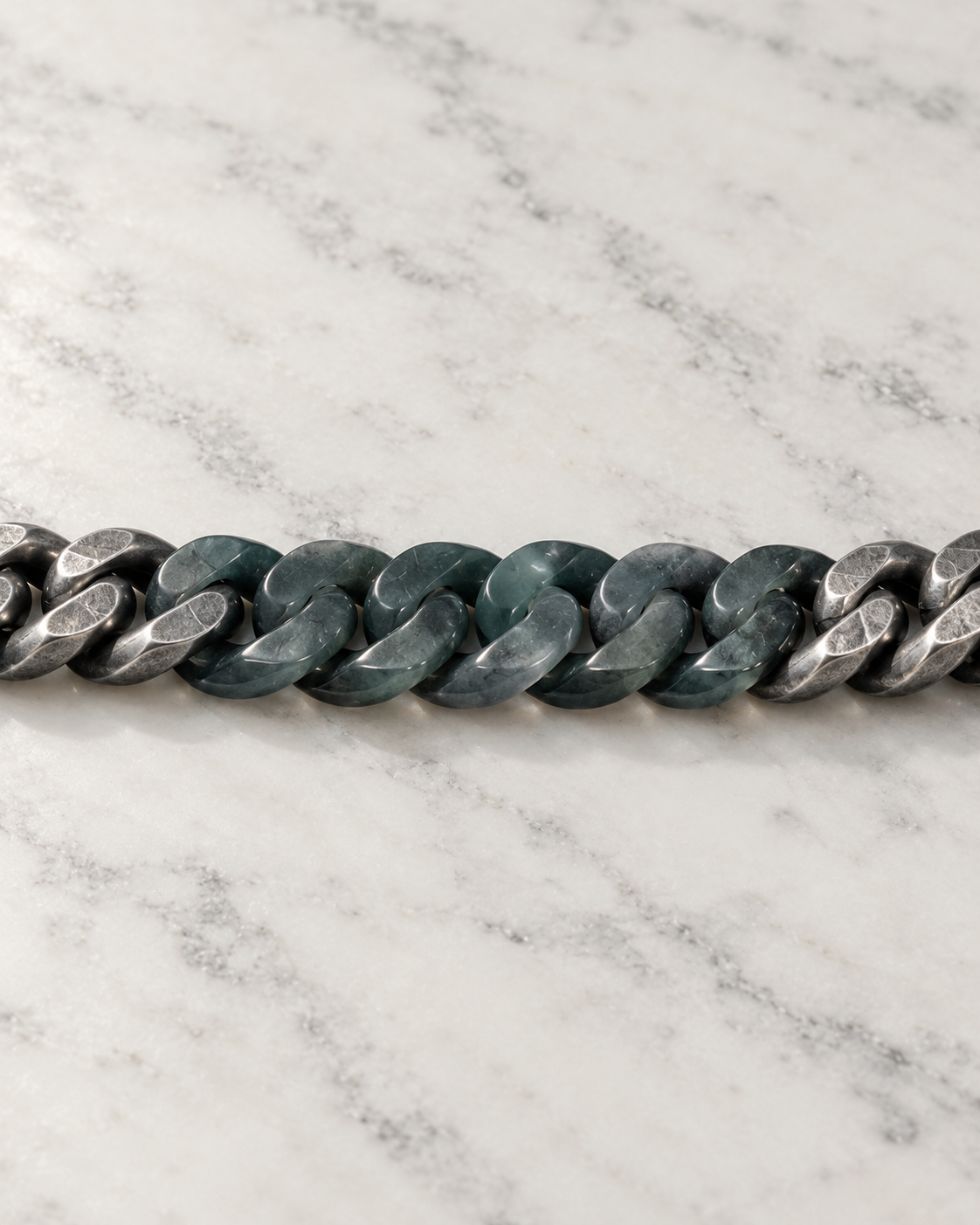 Classic Cuban Chain Bracelet In Black Jade With Oxidized Stainless Steel on white stone: marble tabletop detail — 10mm