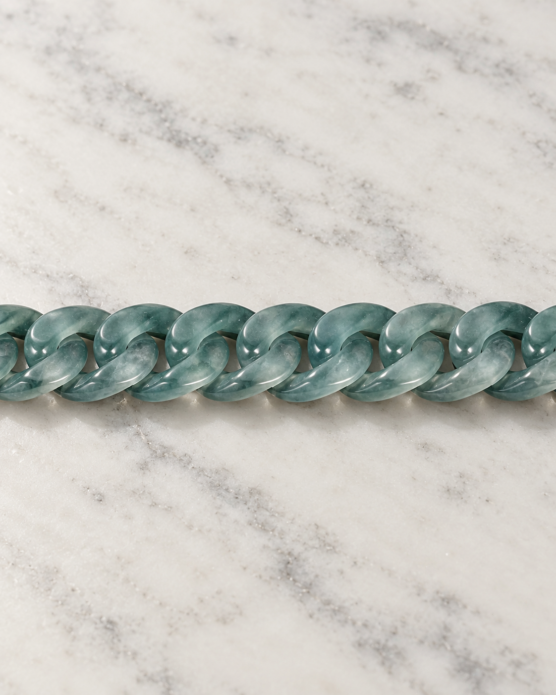 Slim Style Cuban Link Chain Bracelet In Mayan Blue Jade on white stone: marble tabletop detail — 8mm