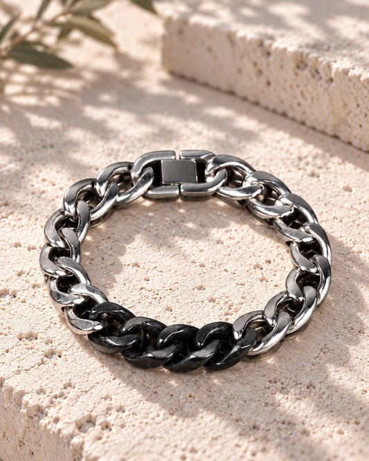 Classic Cuban Chain Bracelet In Black Jade With Stainless Steel on white stone: Pale limestone tabletop